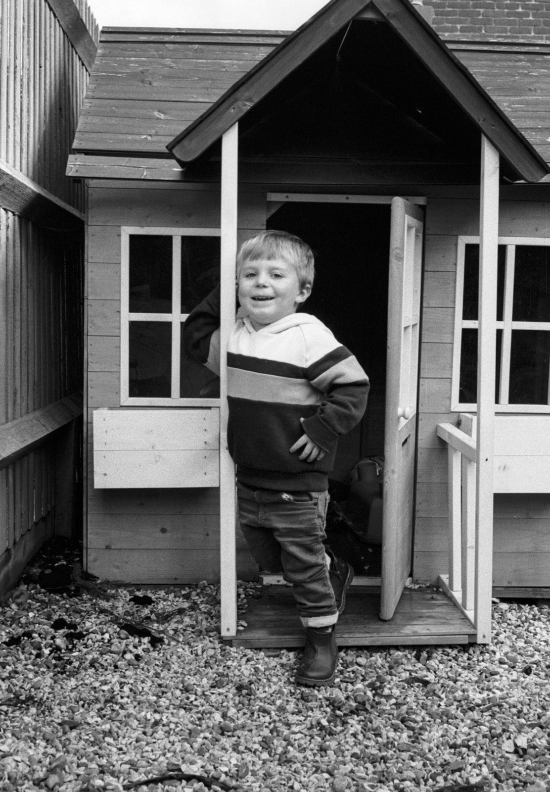 Boy in playhouse