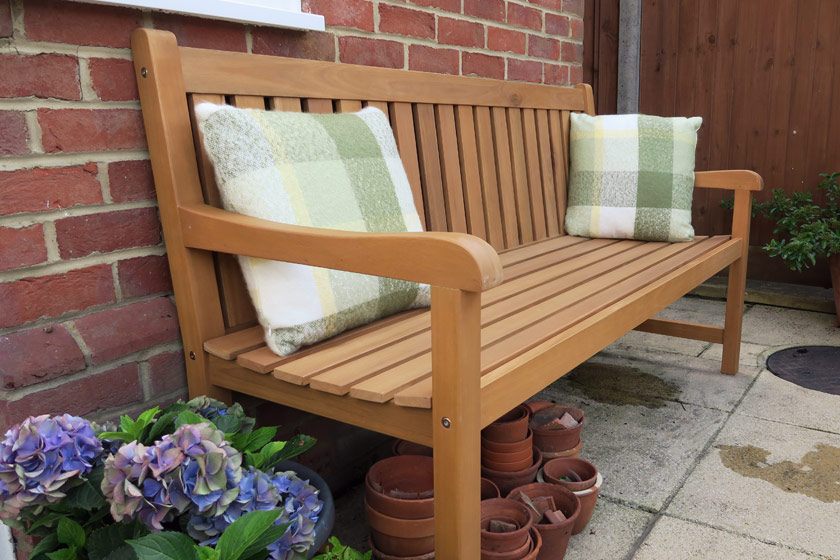 Wooden bench and cushions