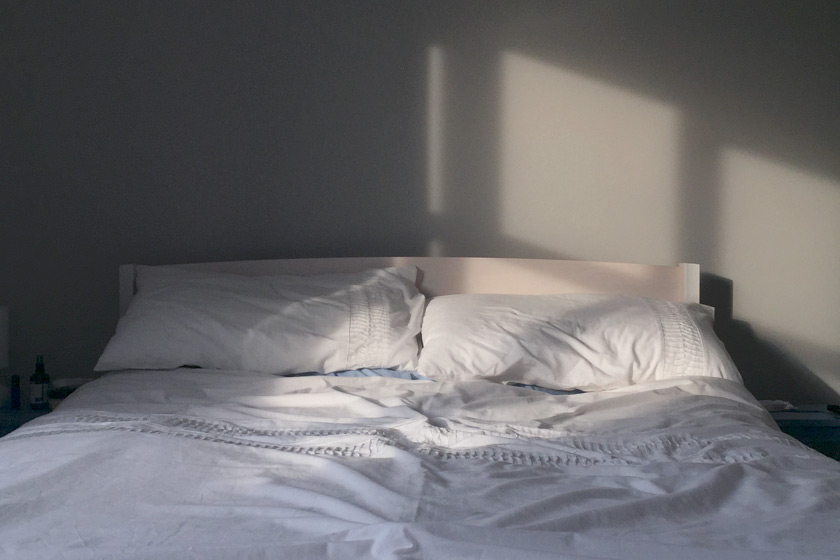 Warm light on bed