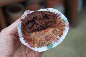 Cupcake in muddy hands