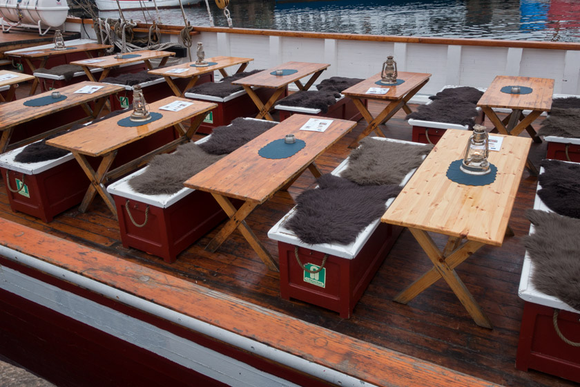 Wooden tables on boat