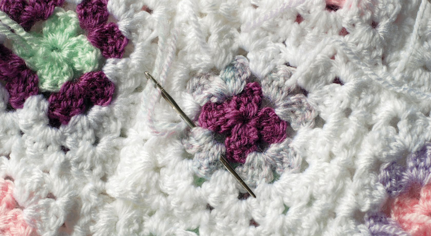 Weaving in granny square ends with wool needle