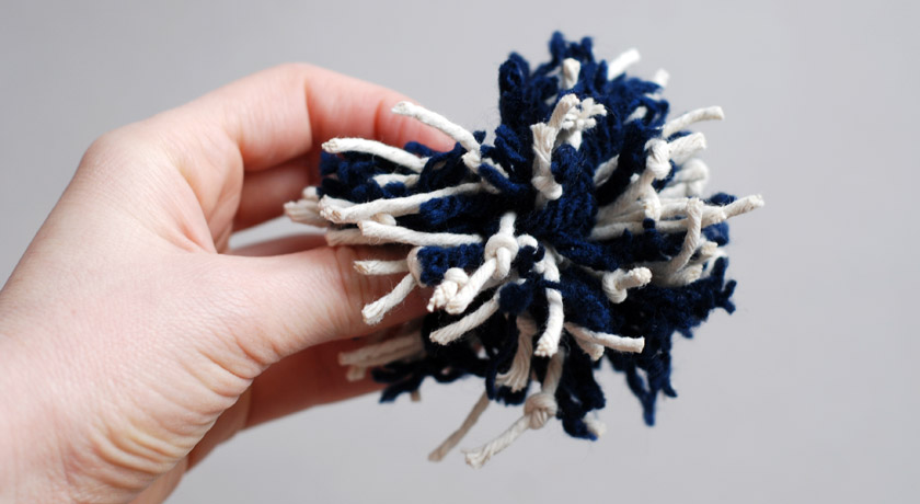 String knot and wool pompom
