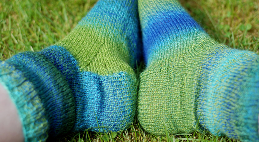 Knitted sock gusset shaping