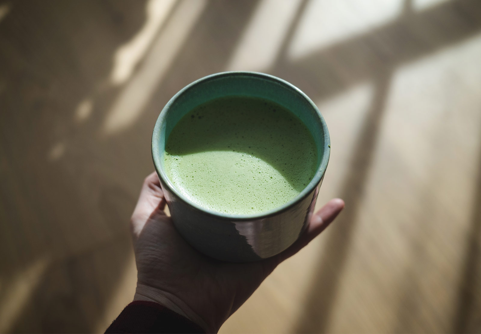 Cup of matcha in the sun
