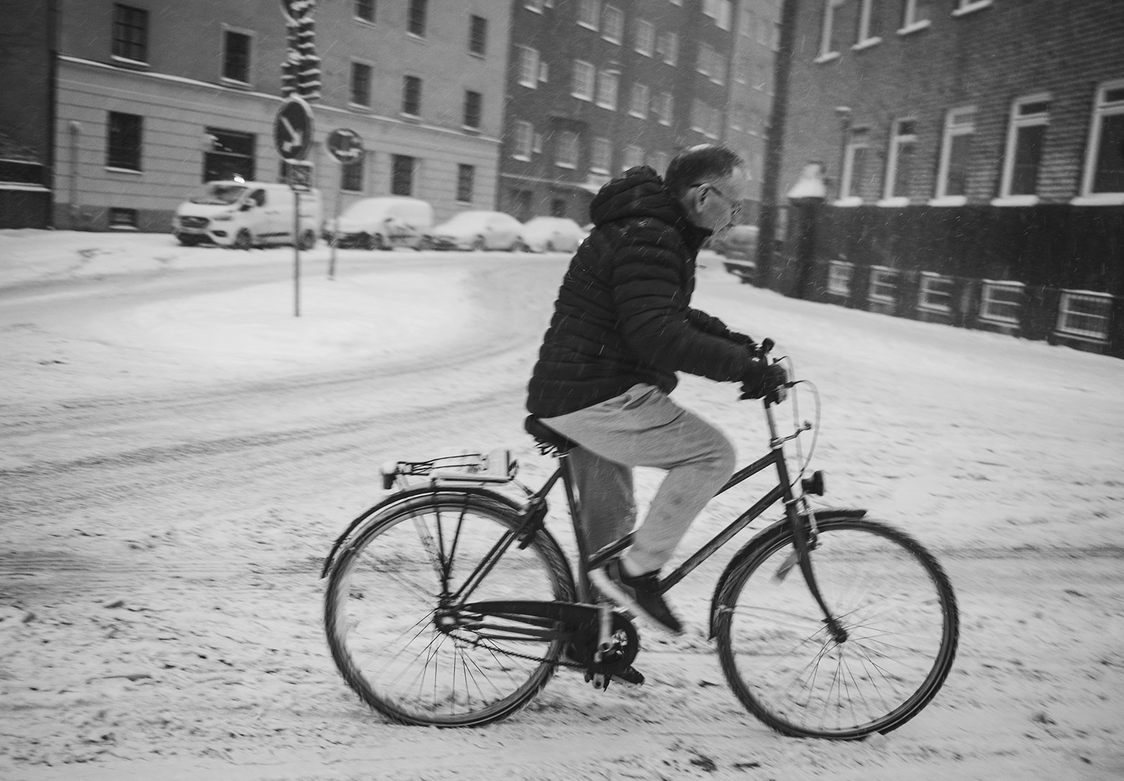 Man cycling in the snow