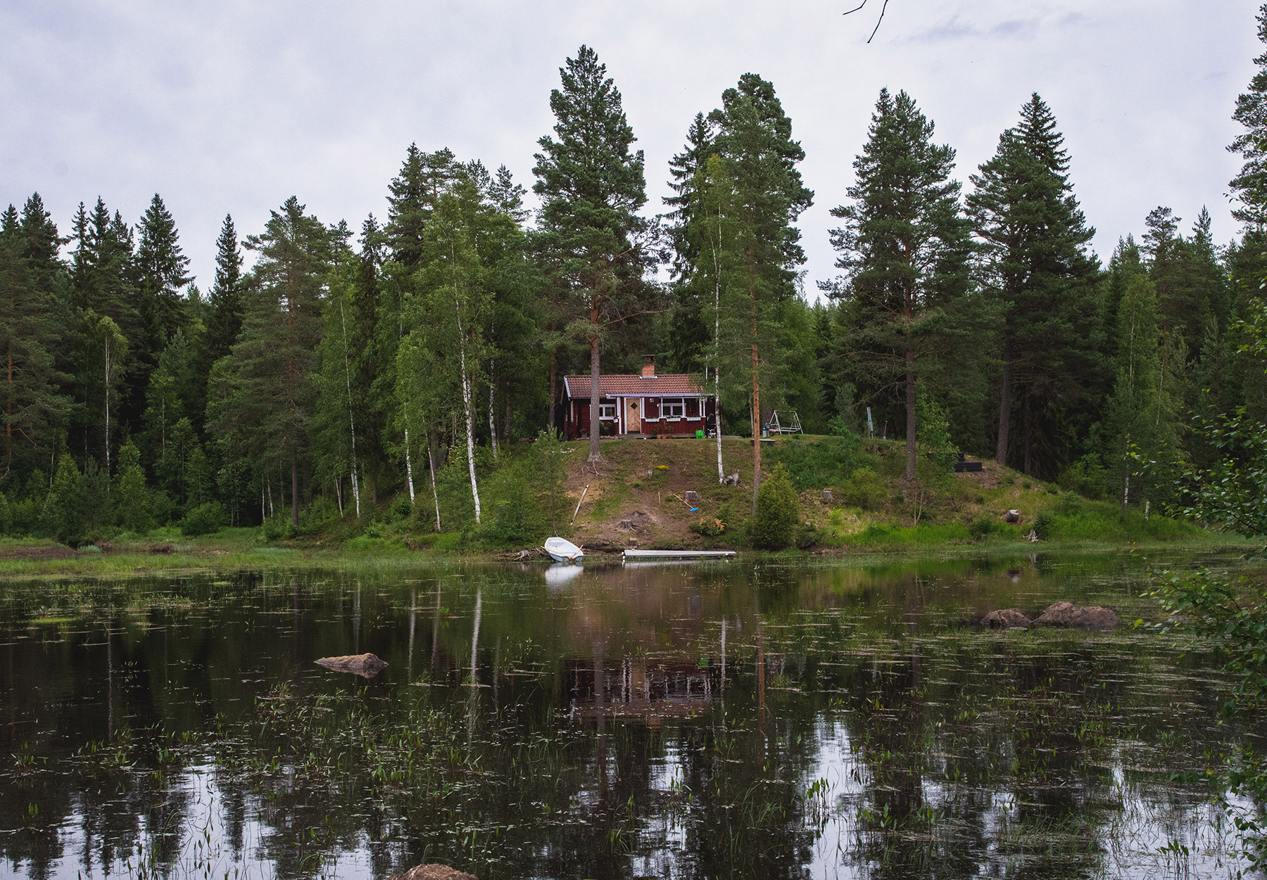 Wooden cabin overlooking lake
