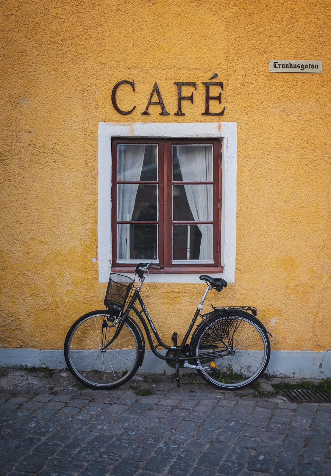 Bike parked outside cafe
