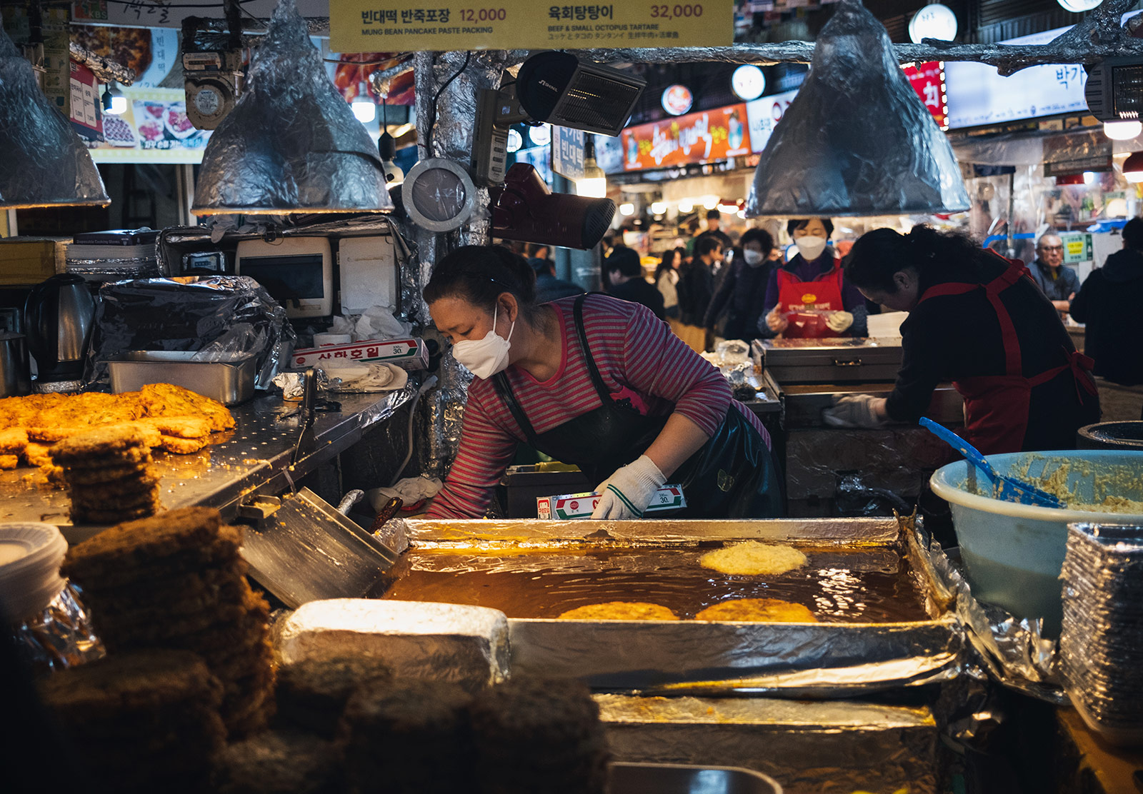 Woman cooking food in market
