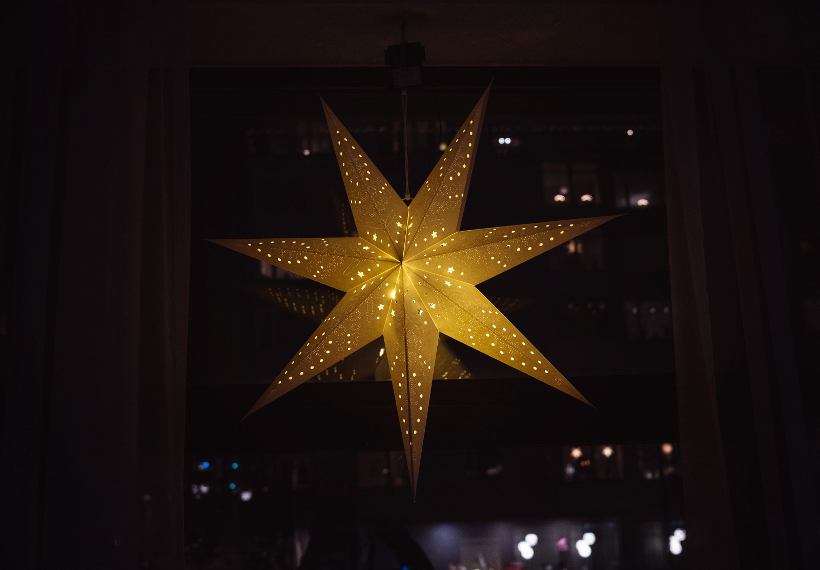 Paper star in window