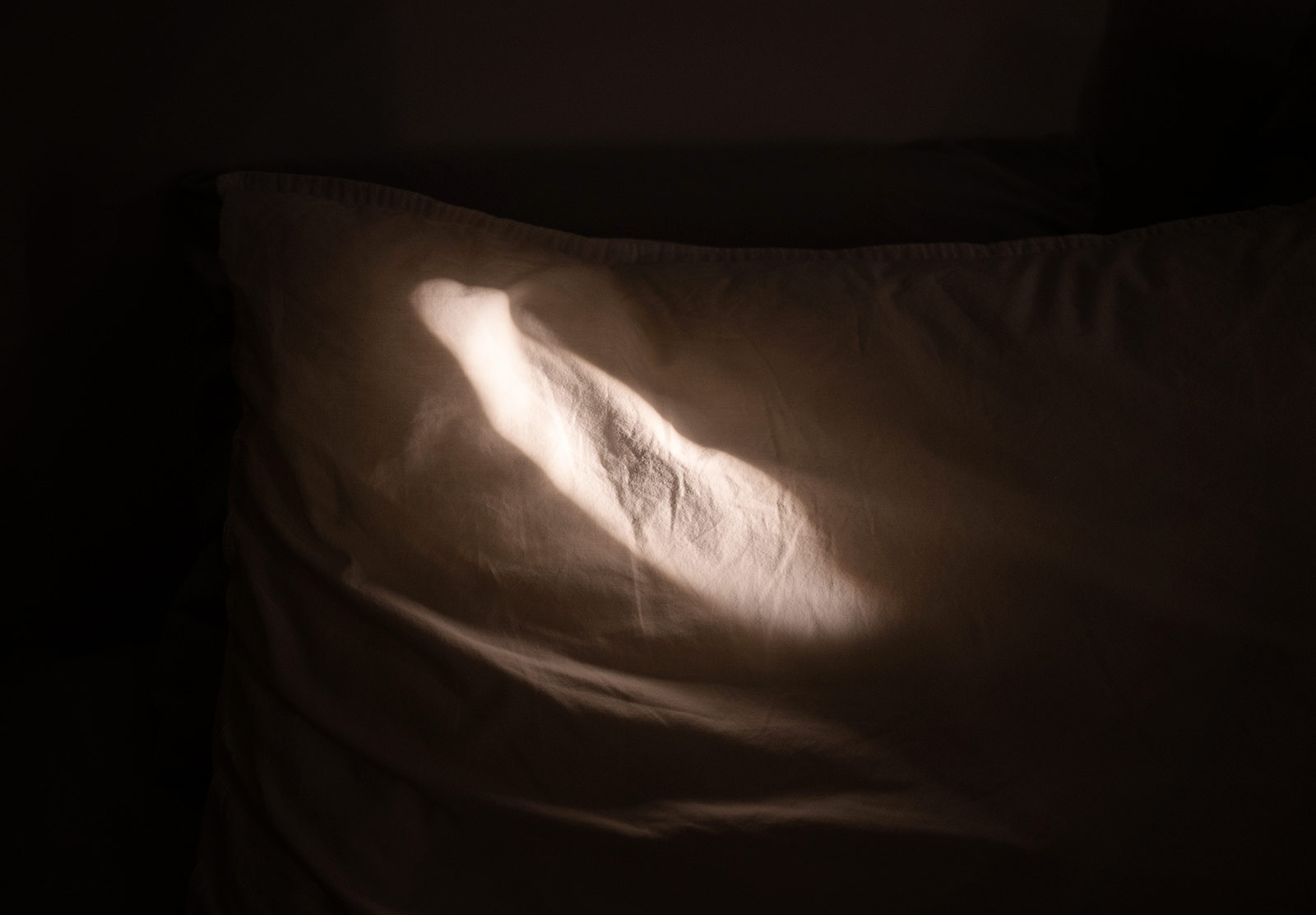 Patch of light on pillow