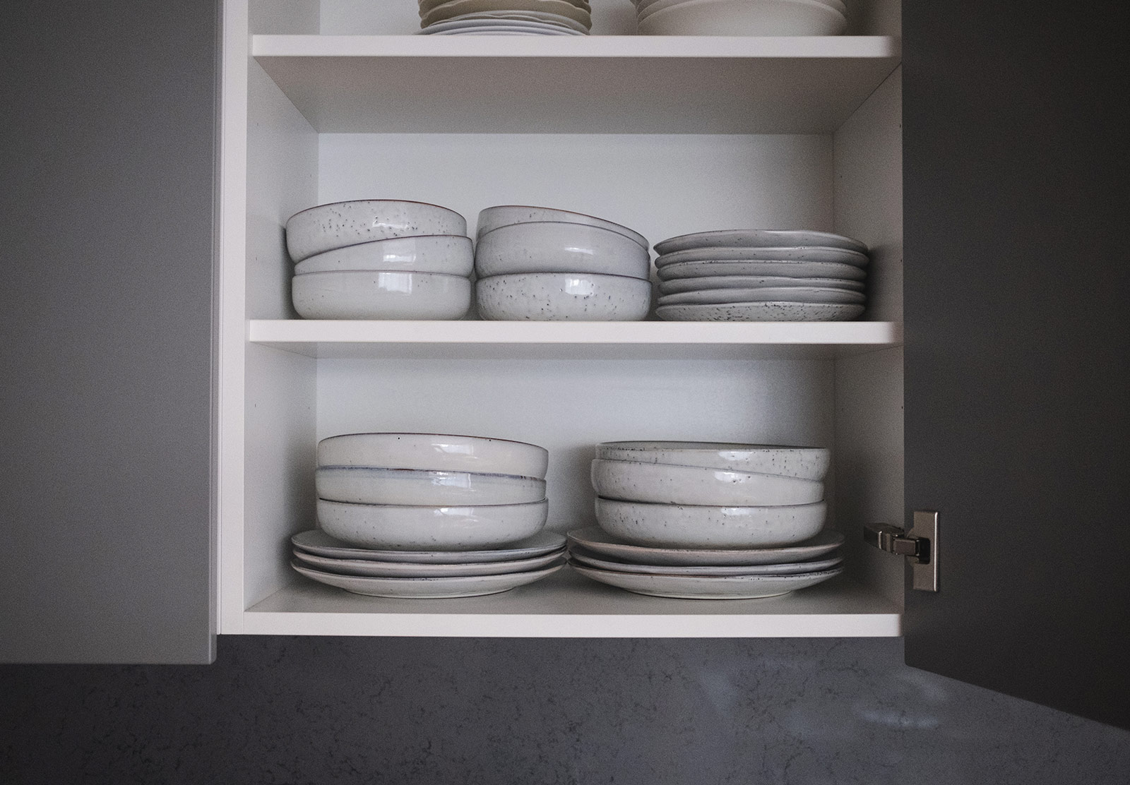 Plates in cupboard