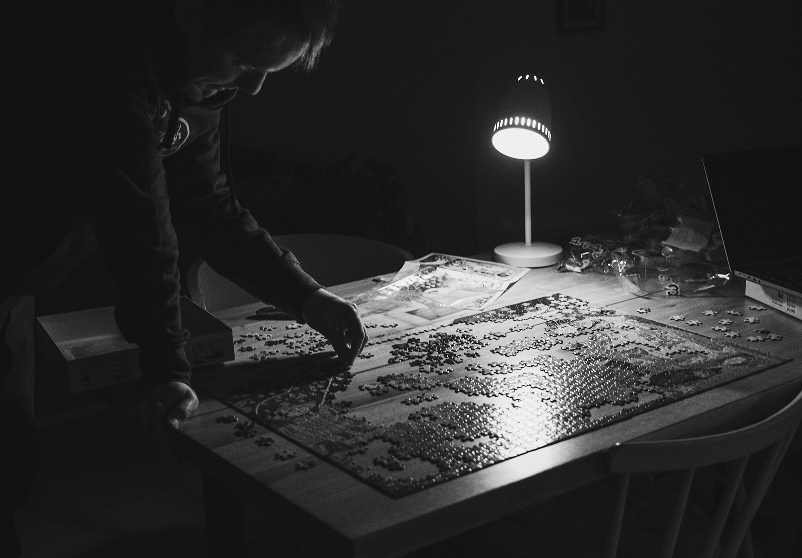 Man working on a jigsaw