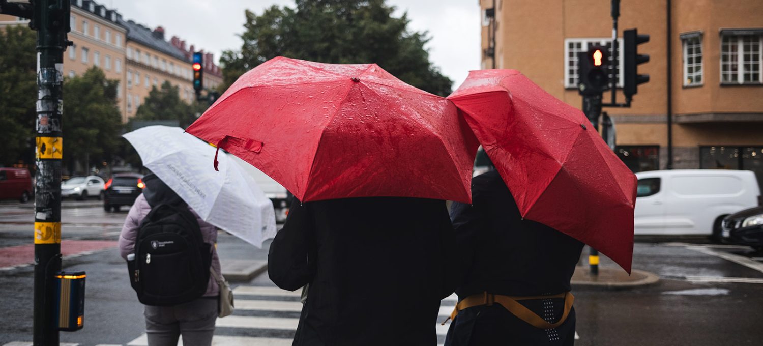 People holding umbrellas