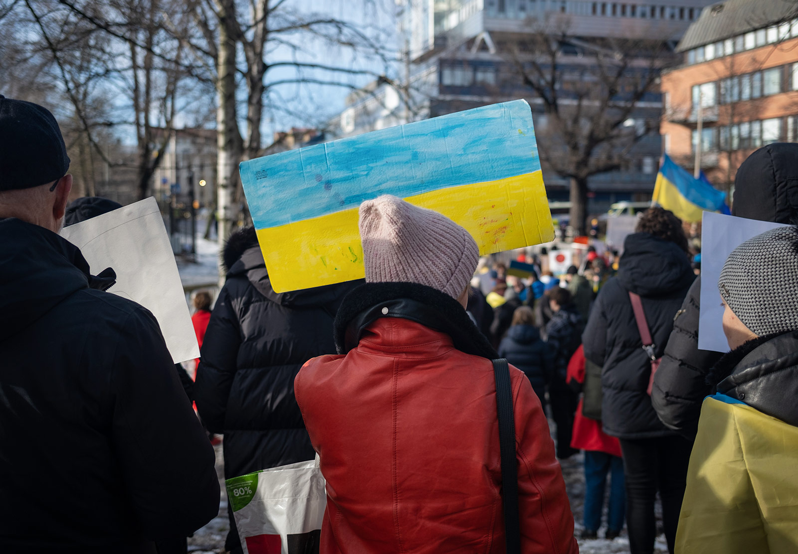 Woman holding Ukranian flag