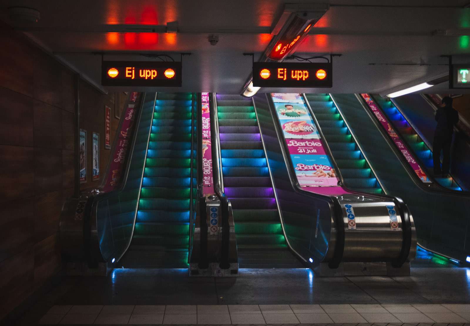 Coloured lights on escalator steps
