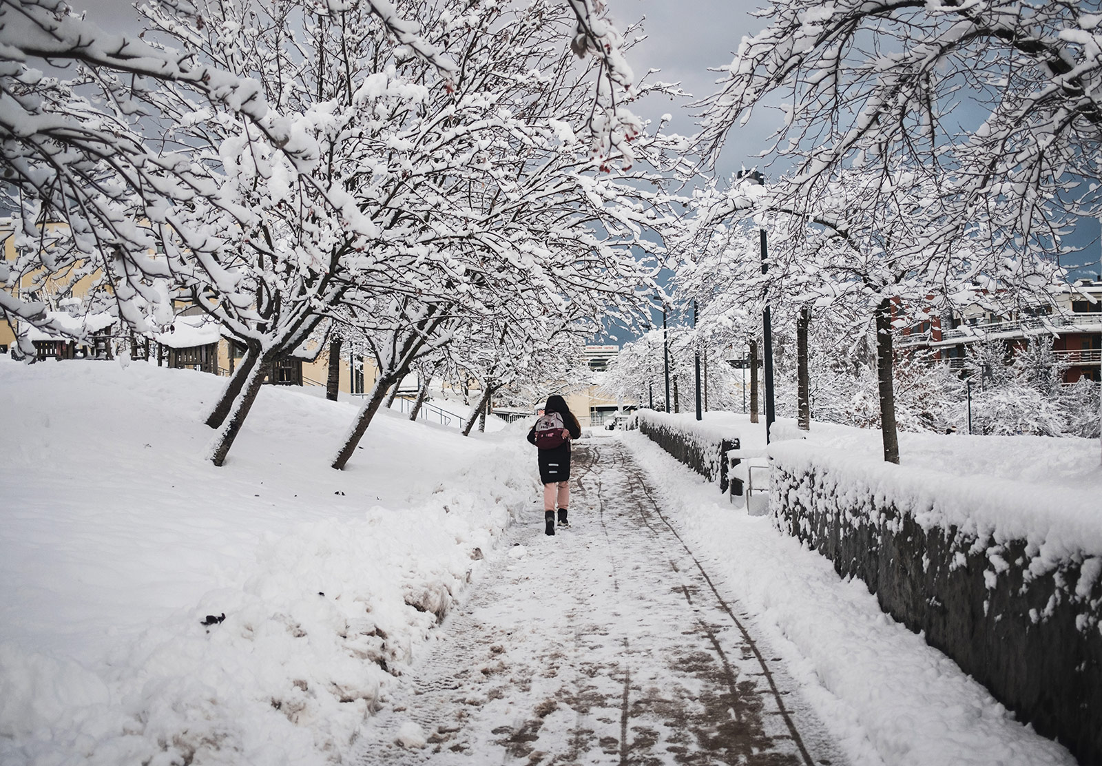 Child walking in the snow