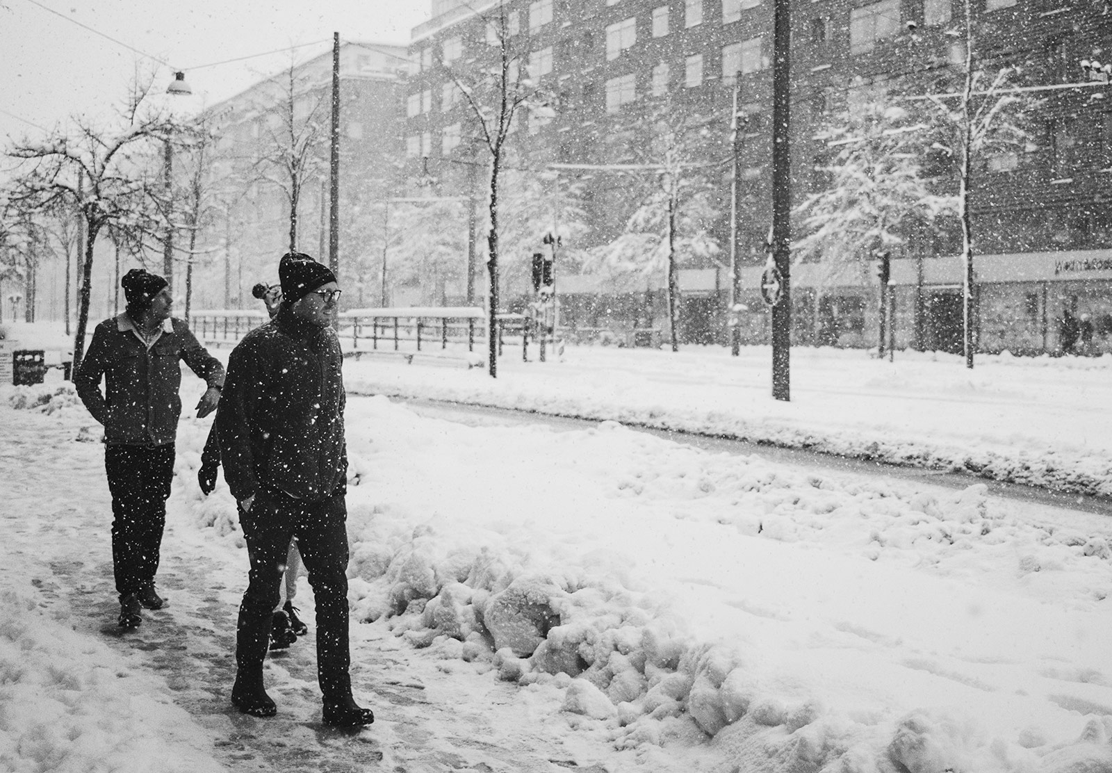 Men walking in the snow