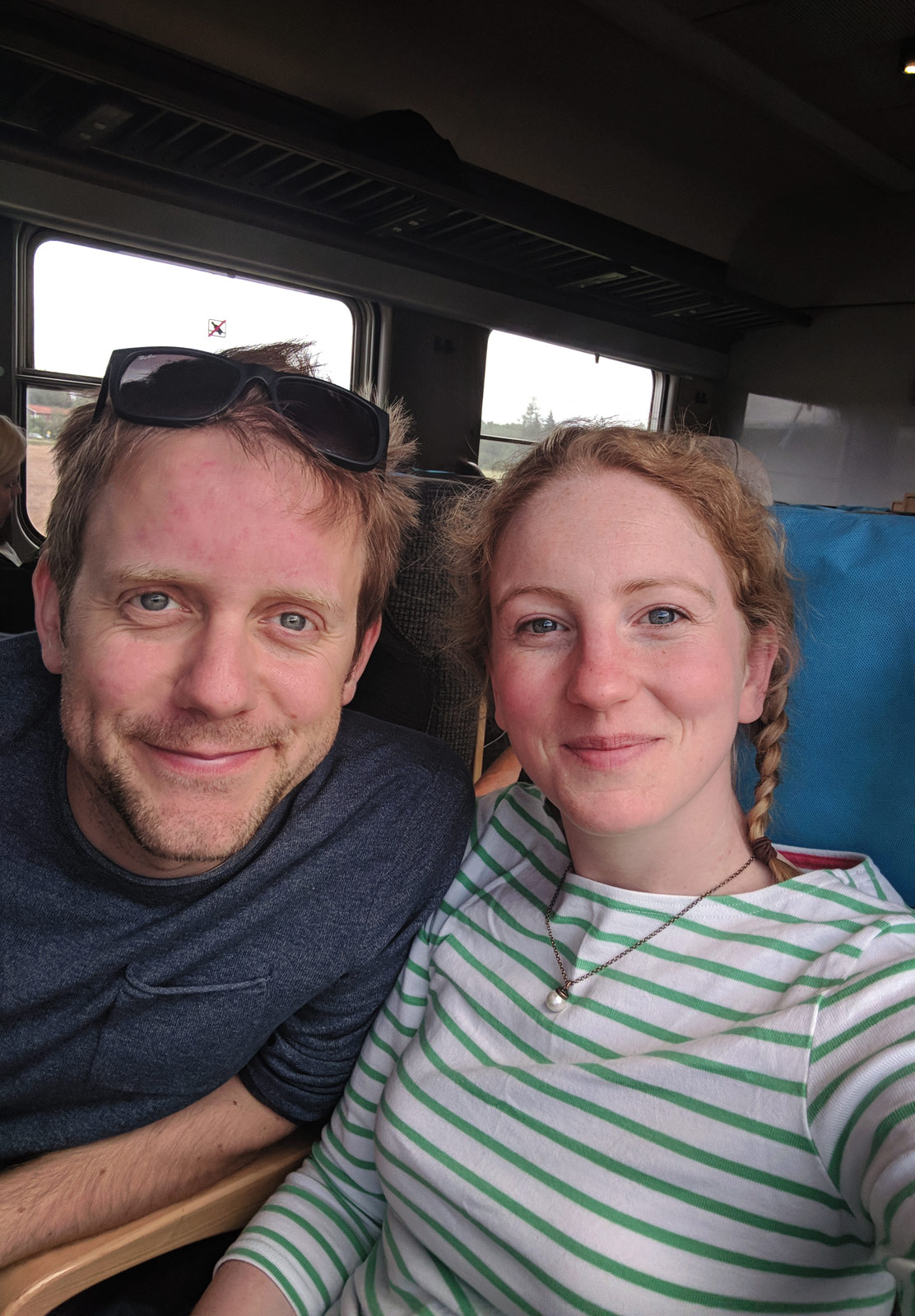 Couple sitting on train