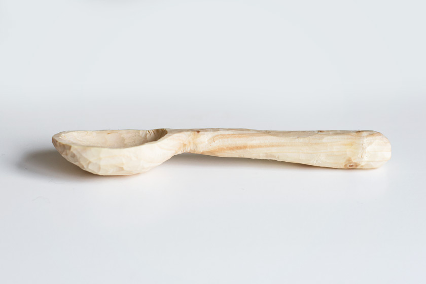Roughly carved wooden spoon