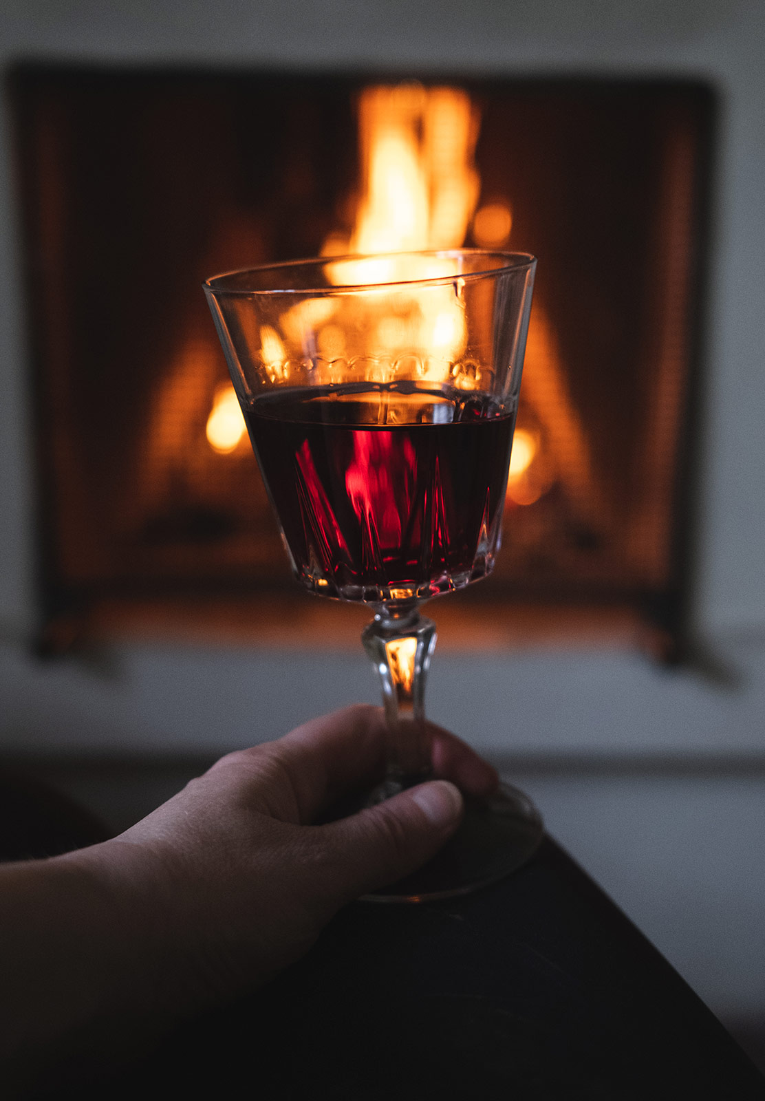 Wine glass in front of fire