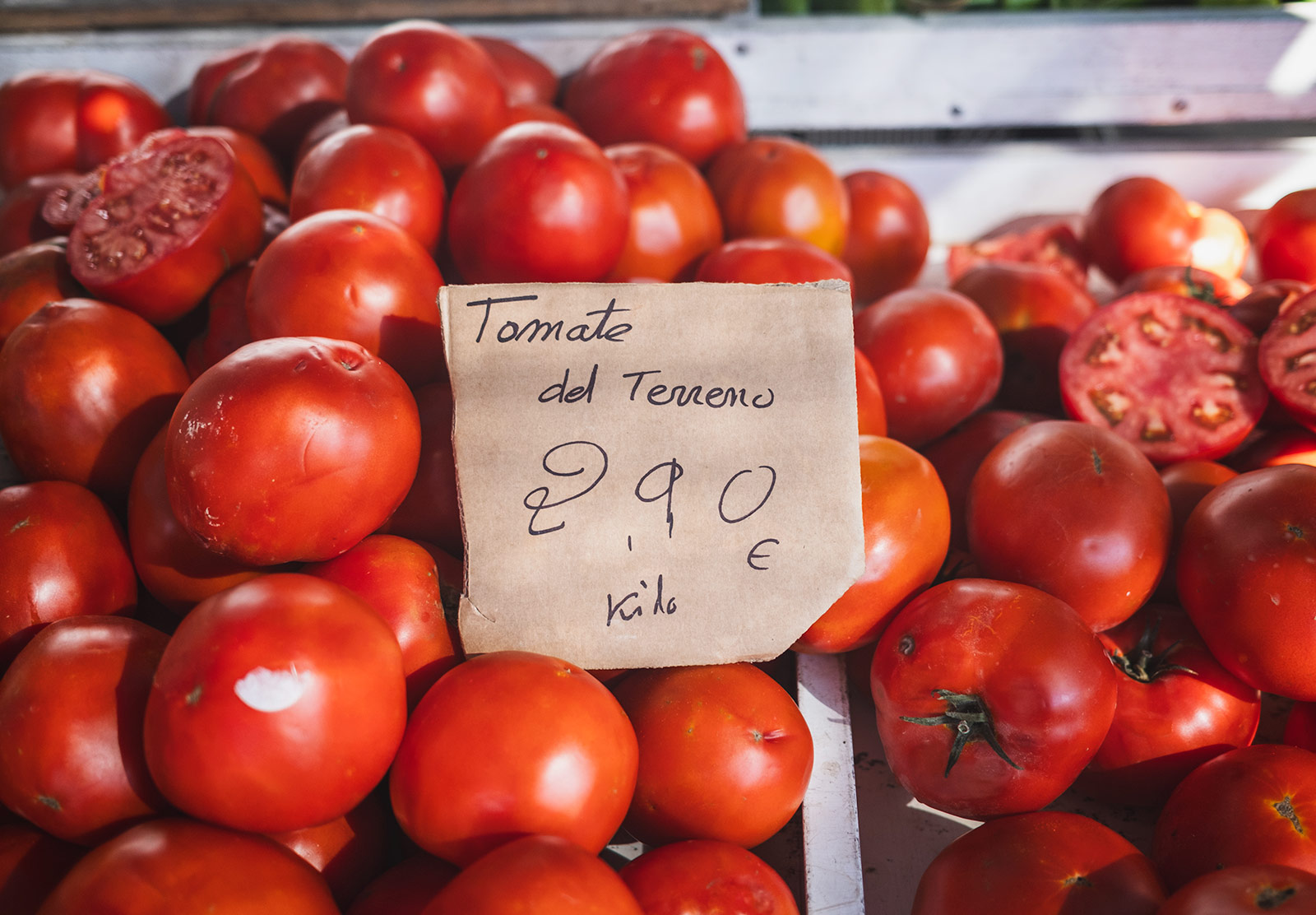 Piles of fresh tomatoes